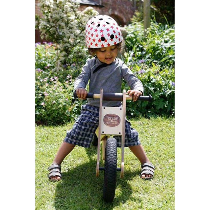 Велосипедний шолом Trybike 44 51см білий з червоними зірочками (COCO 4XS)
